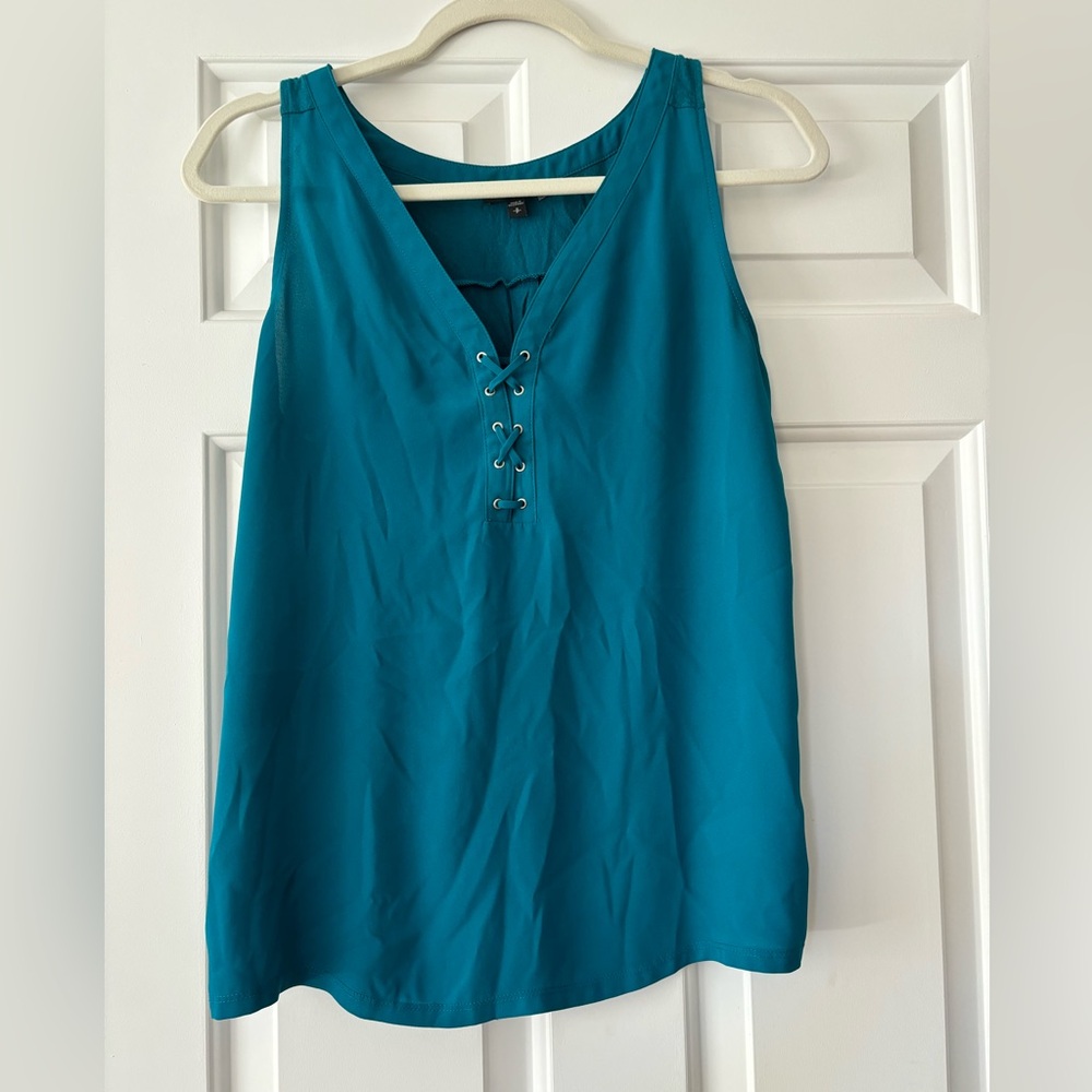 Dressy tank with criss cross detailing